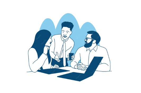 Team meeting with laptops and discussion